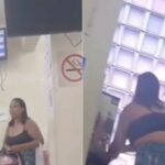 Após dias sem água, mulher toma banho e escova os dentes em agência de saneamento básico, em Minas Gerais