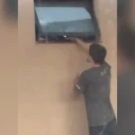 Homem é detido após ser flagrado gravando mulher por janela de banheiro